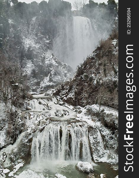 View of the marmore waterfall after a snowfall. View of the marmore waterfall after a snowfall