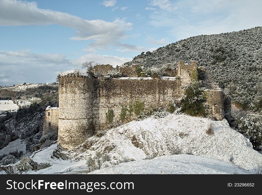 Snow-covered Ruins Of An Ancient Castle