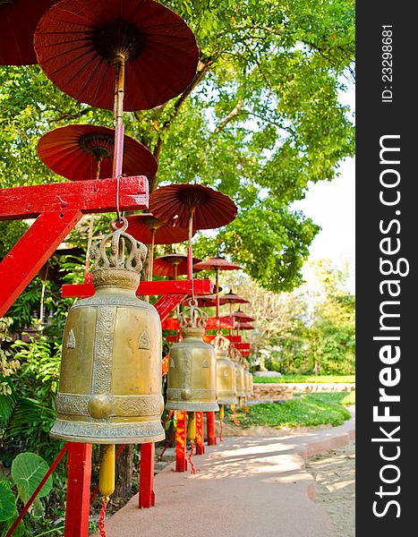 Row of metal bells at buddhist temple in Chaing Mai ,Thailand. Row of metal bells at buddhist temple in Chaing Mai ,Thailand
