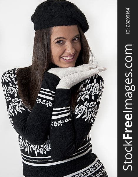 Beautiful young girl in winter clothes photographed in studio. Beautiful young girl in winter clothes photographed in studio