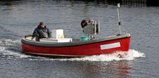 Fisherman In A Motor Boat Royalty Free Stock Photography Fisherman In A Motor Boat Royalty Free Stock Photography