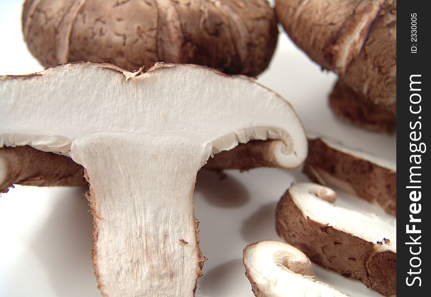 Fresh Asian Mushrooms Close-up with Several Slices