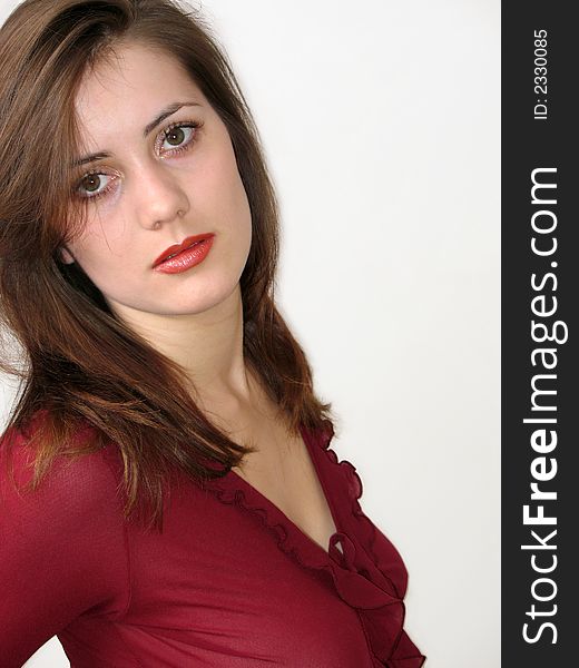 Portrait young sexy woman dressed with dark red blouse. Portrait young sexy woman dressed with dark red blouse