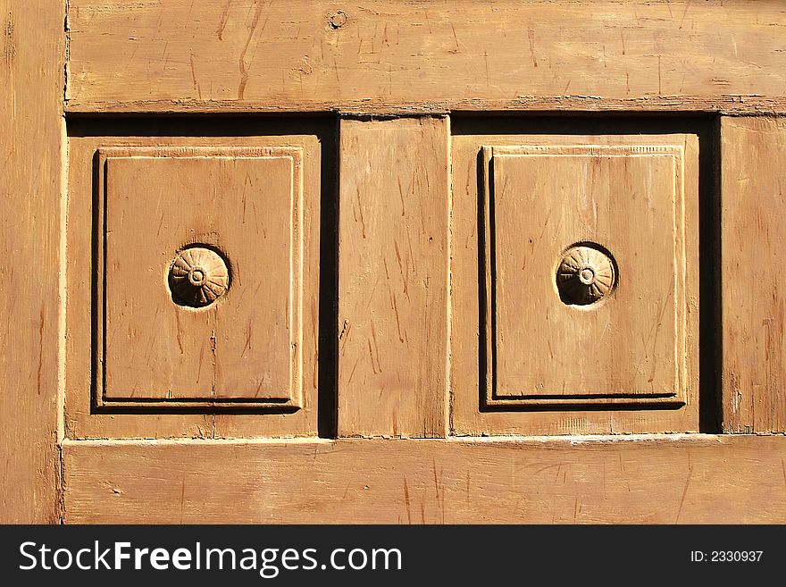 Closeup of a wooden door. Symmetry