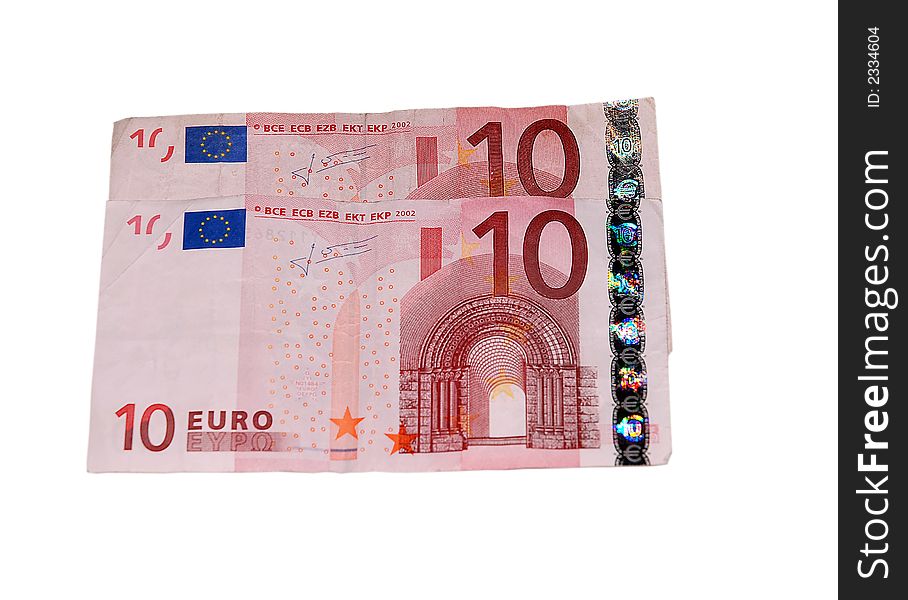 Two ten euros banknotes over a white background