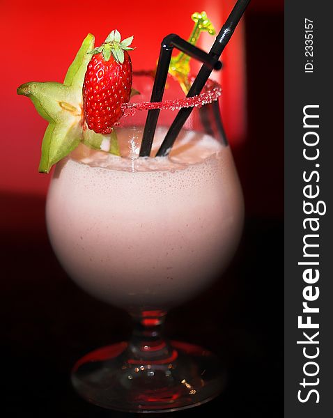 Milkshake with strawberry in glass. Milkshake with strawberry in glass