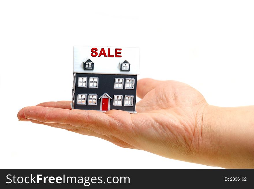 Real estate consept ....hand hold a house