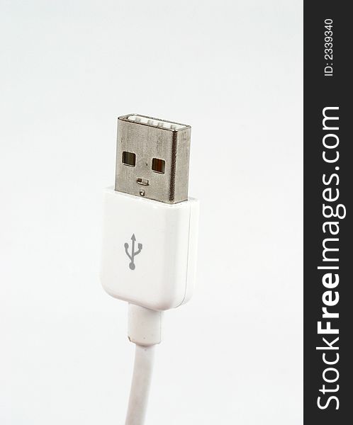 Close up of a USB cable on white background
