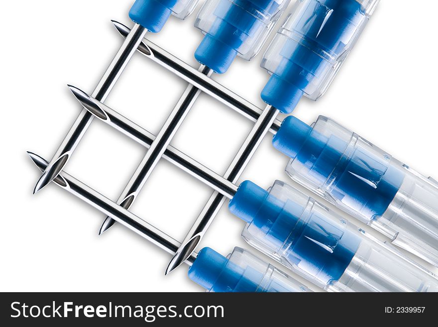 The biggest syringe needles woven together on the white, these needles are used for biopsy and never for vaccination