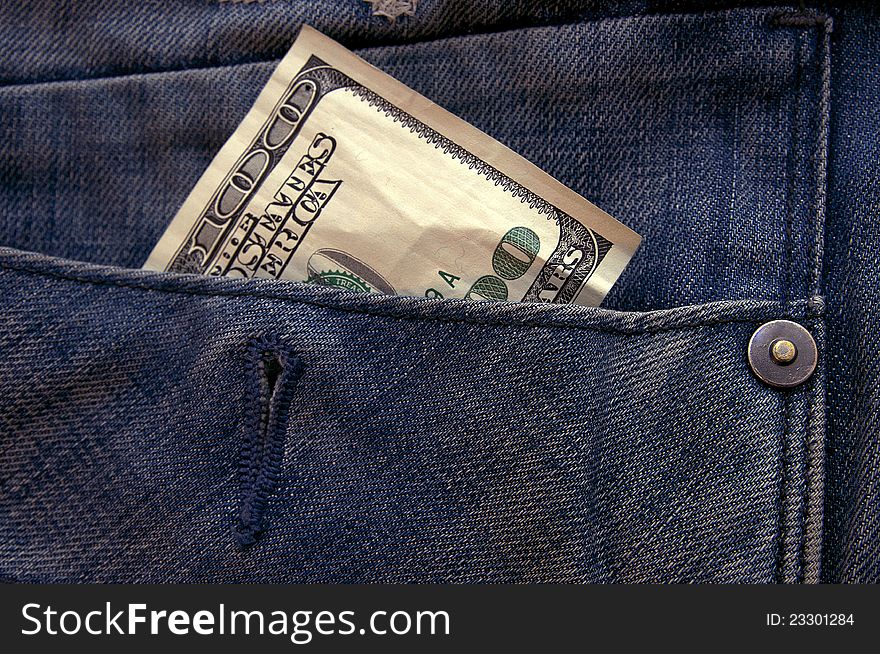 Bill of one hundred dollars in his pocket jeans. Bill of one hundred dollars in his pocket jeans