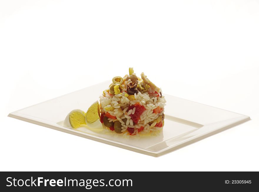 Rice salad on white plate