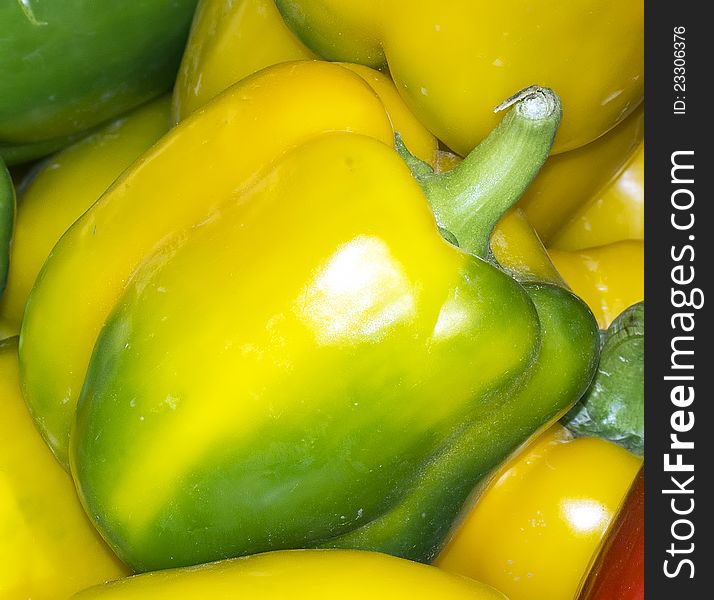 Some yellow peppers at market place