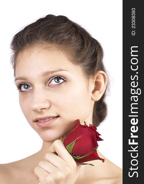 Young beautiful girl with red flower isolated on a white background