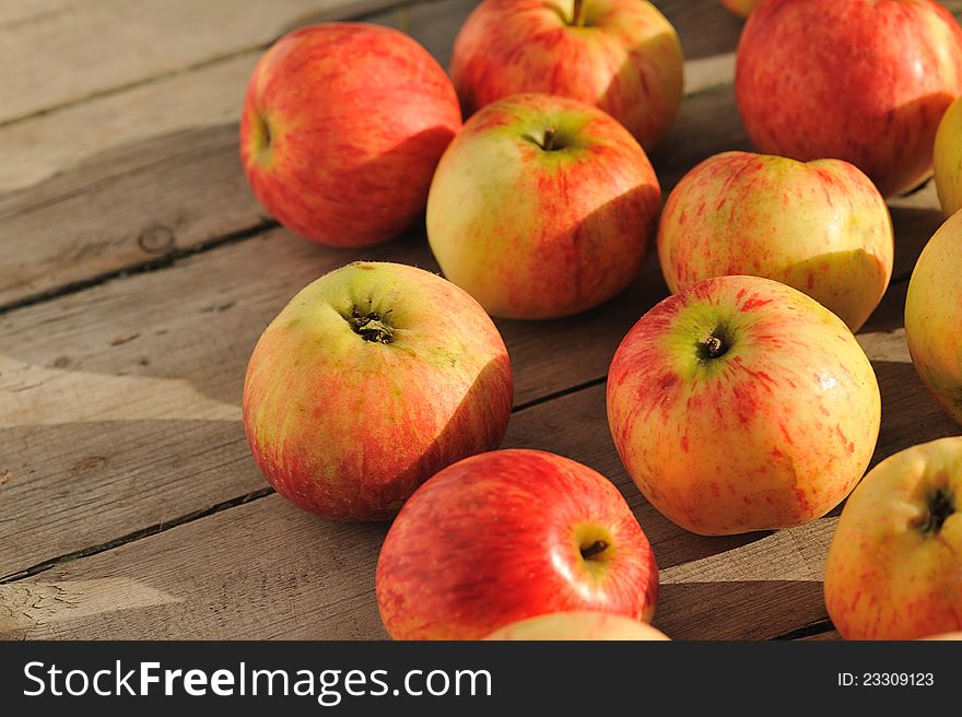 Apples on wood surface close up. Apples on wood surface close up