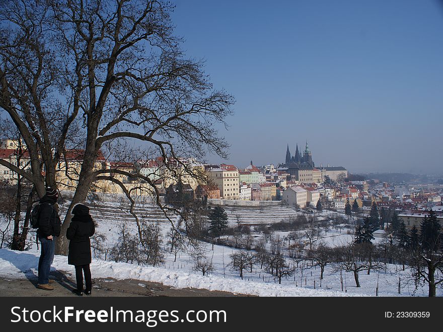 Tourists On A Tour Through Prague