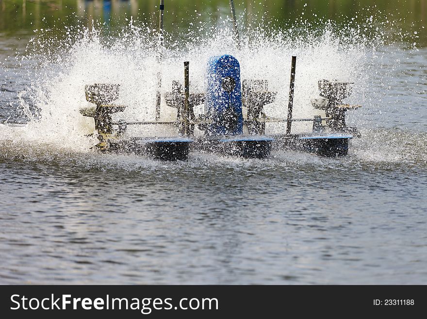 Water Turbine a water wheel floating on the pond in a park