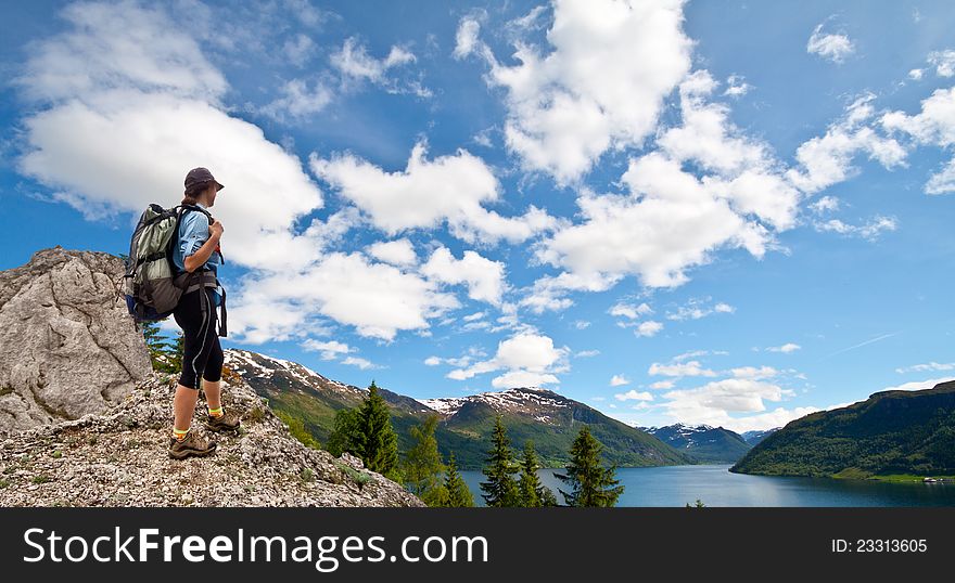 Woman on the top of rock in mountains, Norway. Woman on the top of rock in mountains, Norway