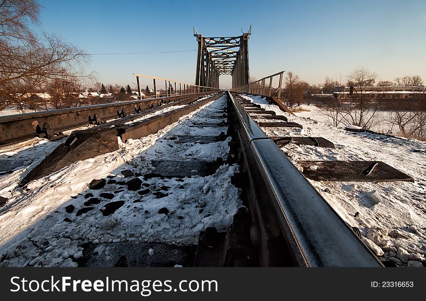 Railway bridge in the winter with low-angle. Railway bridge in the winter with low-angle