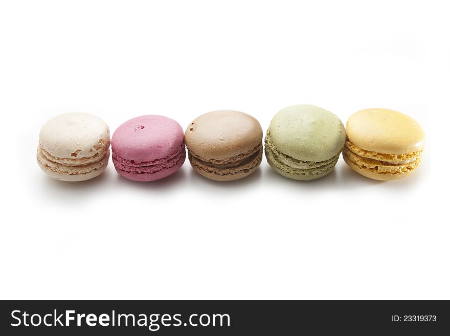 Colorful macarons shot on a white background