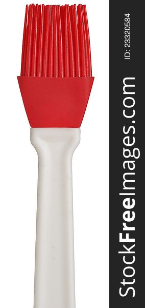 A red and white silicone pastry brush on a white background