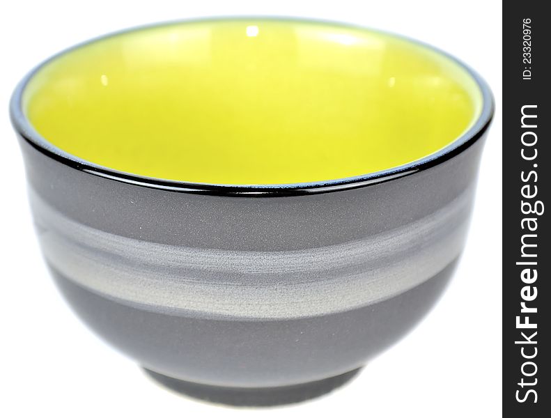 An empty Chinese tea bowl isolated on a white background