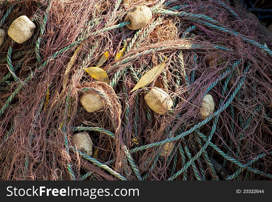 Close-up of fishing net and floats background