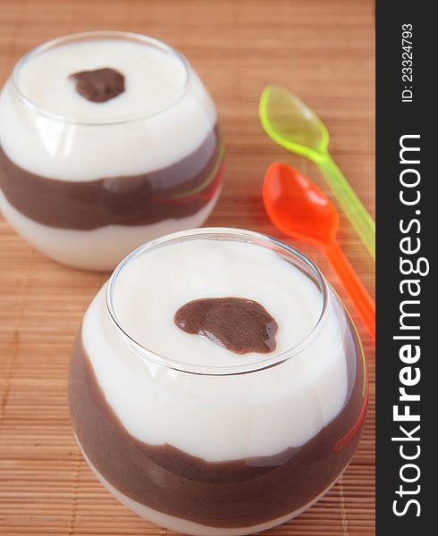 Two glasses of milk-chocolate dessert