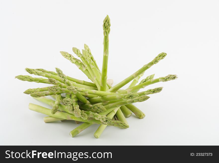 Asparagus sprouts isolated on white background