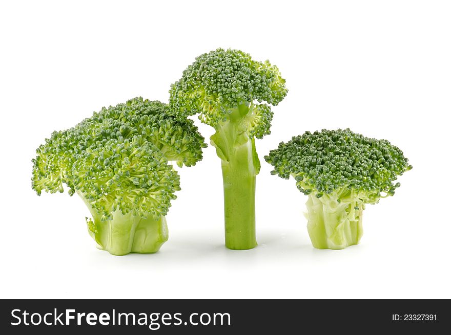 Three broccoli florets isolated on white background