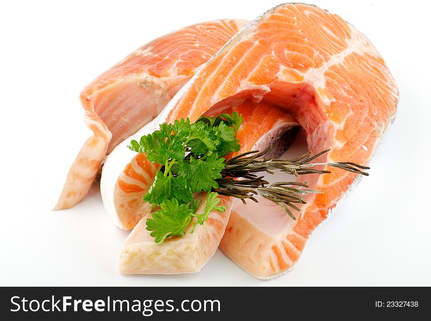 Fresh steak of trout with parsley and rosemary