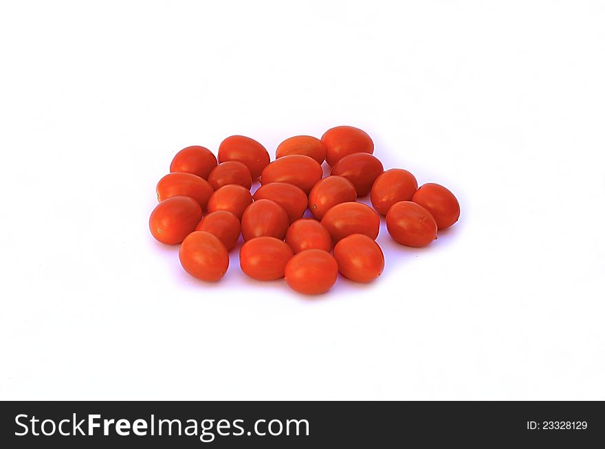 Red, small cherry tomat on white background