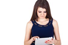 Brunette Woman Typing On Her Touch Pad Isolated Royalty Free Stock Image