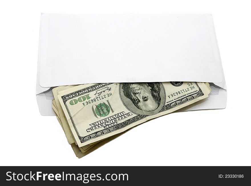 Dollars cash in a paper envelope on a white background. Dollars cash in a paper envelope on a white background