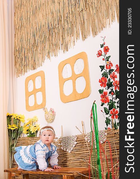 Children In Ukrainian National Costume On Bench