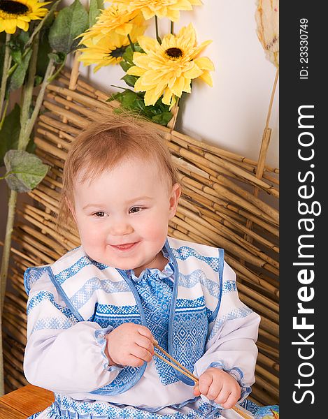 Little Girl in the Ukrainian national costume smiling. Little Girl in the Ukrainian national costume smiling