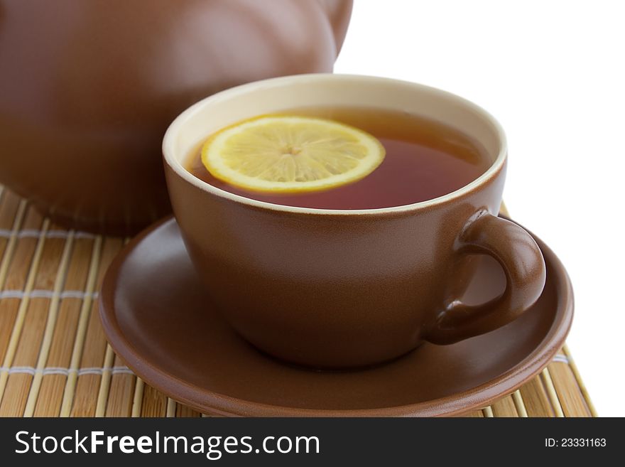 Ceramic cup of tea with lemon