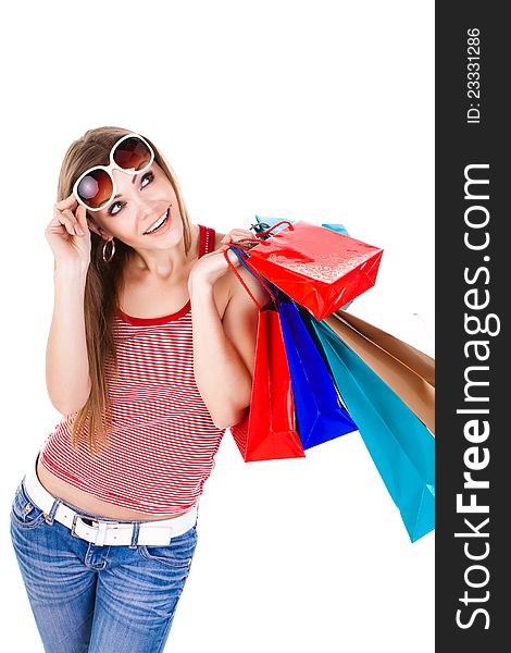 Young beautiful woman holding shopping bags isolated. Young beautiful woman holding shopping bags isolated