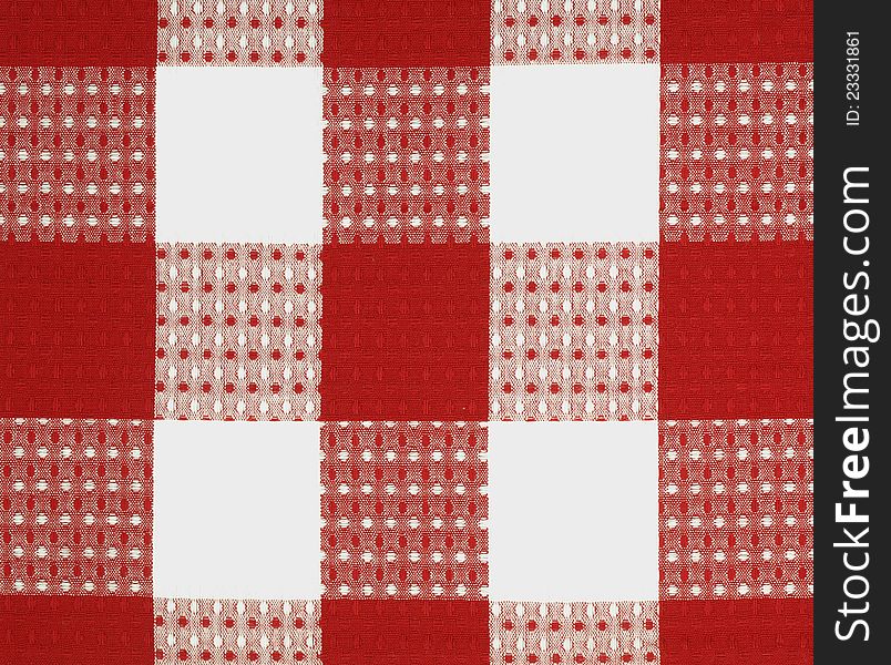 Red and white square fabric design. Red and white square fabric design