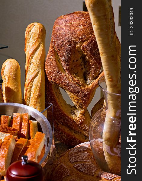 Loaves of different types of bread on display. Loaves of different types of bread on display.