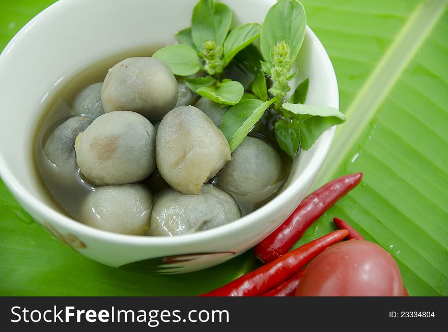 Thai traditional mushroom soup whit green background. Thai traditional mushroom soup whit green background.