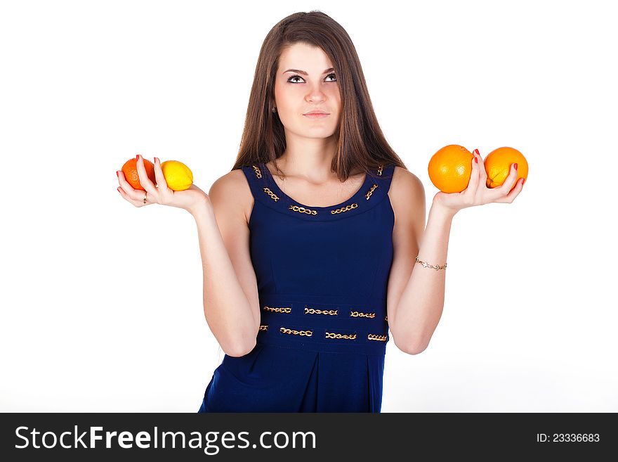 Pretty woman with straight hair with oranges isolated. Pretty woman with straight hair with oranges isolated