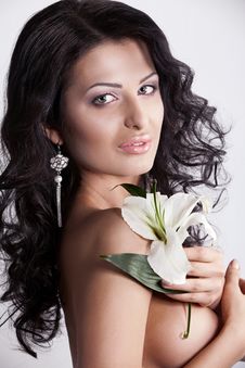 Beautiful Young Woman With Lily Flower. Stock Images