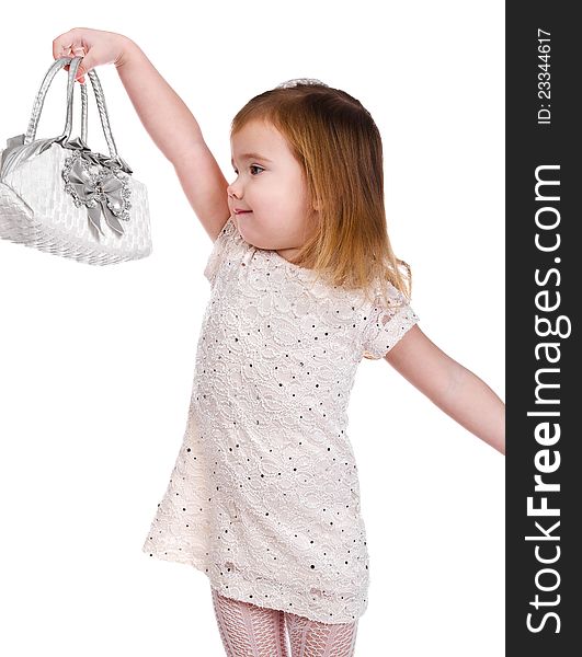 Portrait of cute little girl with a bag on a white