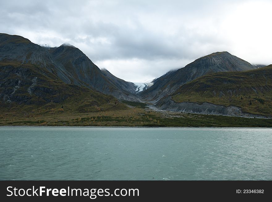 Glacier between mountains in natural glacier bay park, alaska. Glacier between mountains in natural glacier bay park, alaska