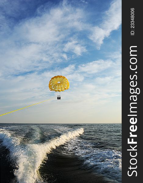 Parasail being pulled by a boat in the ocean