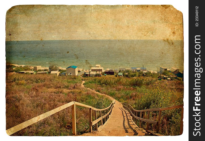 A staircase leads down to the sea. Old postcard, design in grunge and retro style. A staircase leads down to the sea. Old postcard, design in grunge and retro style