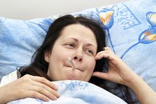 The Girl Was Lying In Bed And The Temperature Royalty Free Stock Photography The Girl Was Lying In Bed And The Temperature Royalty Free Stock Photography