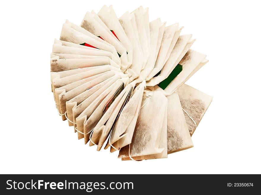 Bags of black tea on a white background
