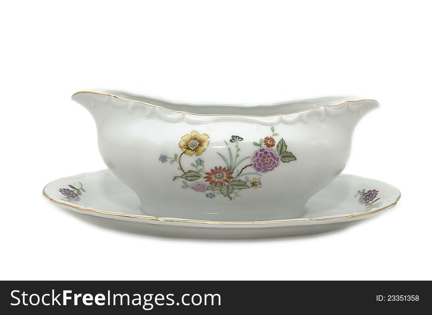 Old porcelain dishes on a white background. Old porcelain dishes on a white background