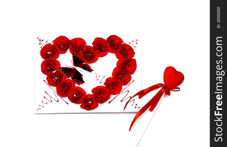 Red heart and a postcard for st. Valentine s day